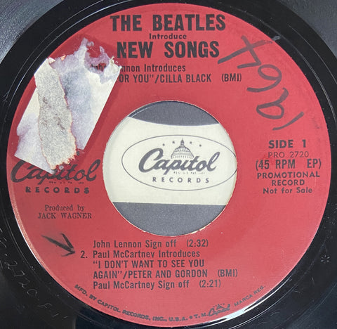 Beatles Introduce New Songs